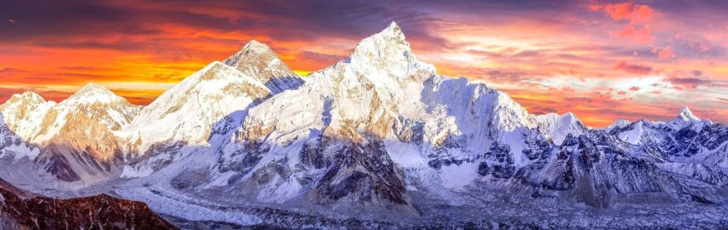 Everest-Base-Camp-trek-with-trekkers-amongst-peaks-and-prayer-flags-reflecting-adventure-and-culture.