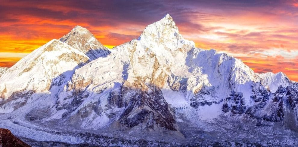 Everest-Base-Camp-trek-with-trekkers-amongst-peaks-and-prayer-flags-reflecting-adventure-and-culture.