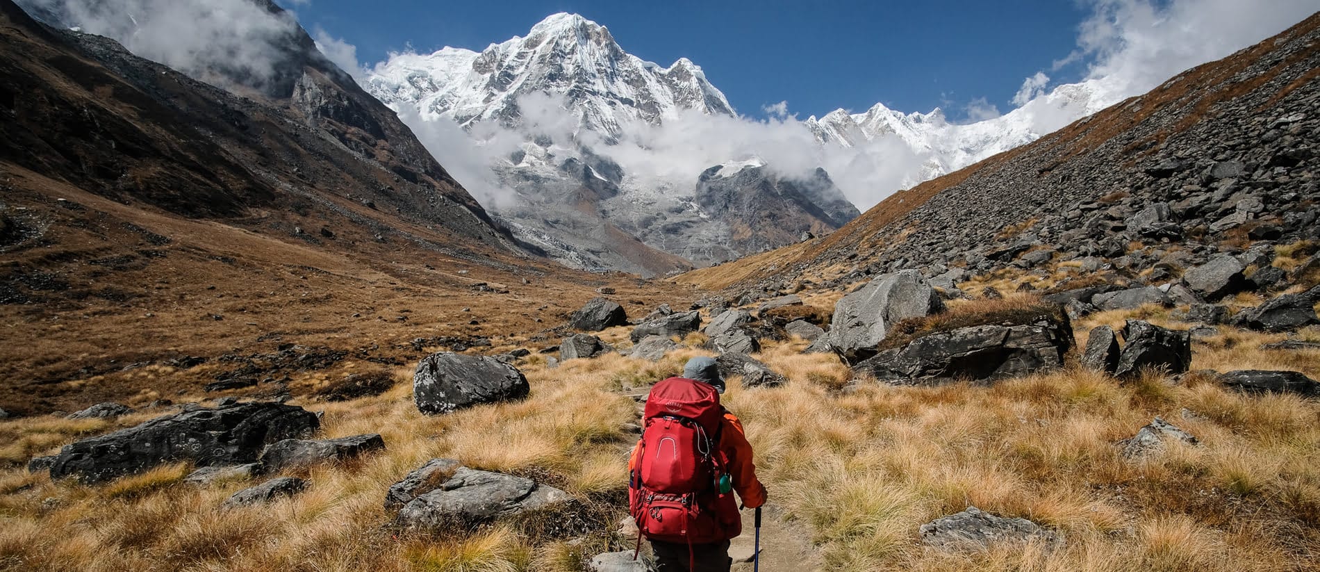 a trekker trekking around beautiful annapurna base camp