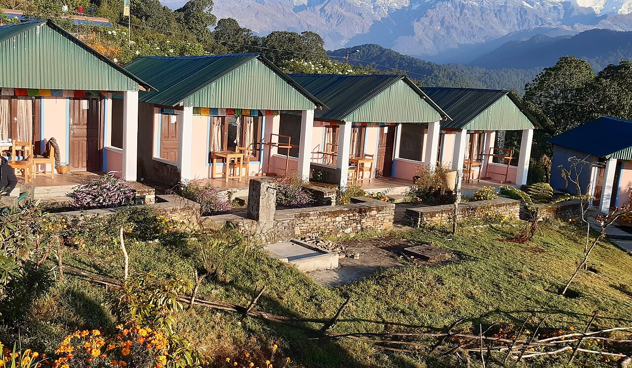 Teahouse rooms with green roofs at Australian Base Camp in Nepal